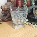 Vintage pressed glass bon bon or biscuit jar with a stainless steel lid
