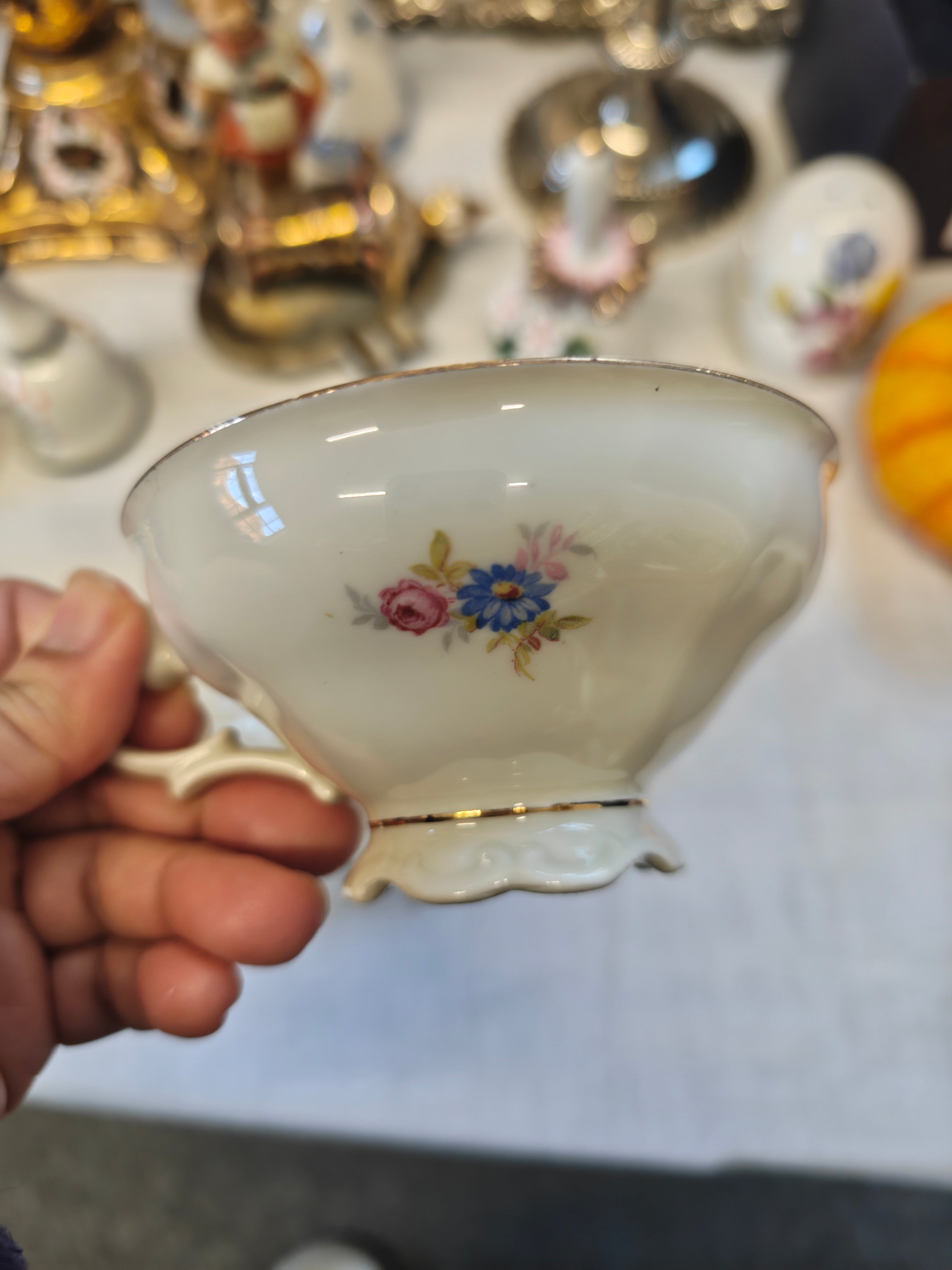 Vintage Bavarian embossed pedestal-foot tea cup and saucer