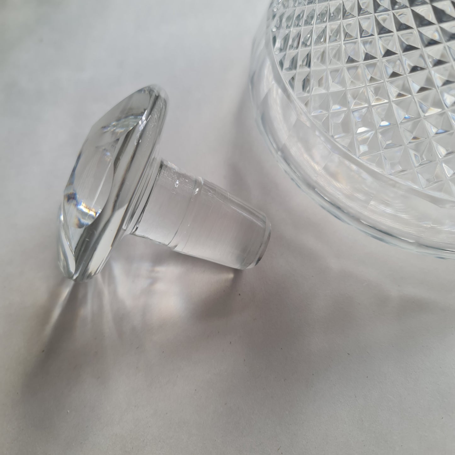 19th century ships decanters and stoppers
the ribbed necks above hobnail cut bands, 23cm high