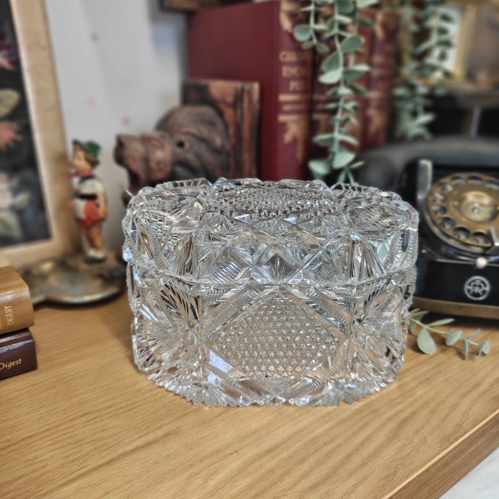 Early 20th-century cut crystal lidded box or bowl, potentially from the American Brilliant Period (ABP) or Bohemian crystal tradition.