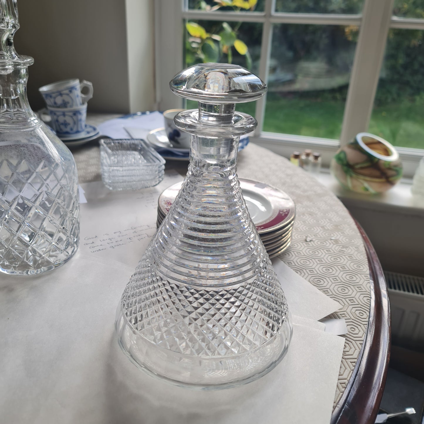 19th century ships decanters and stoppers
the ribbed necks above hobnail cut bands, 23cm high