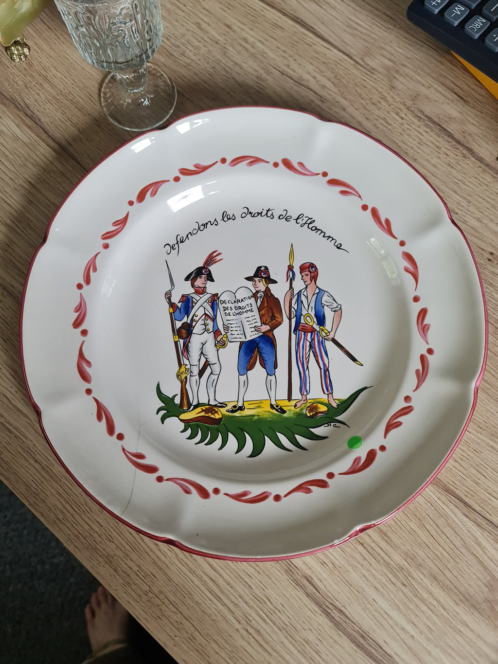 French potter St. Clement, a French Revolution themed plate. Small cracks line on plate