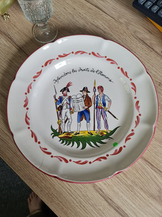 French potter St. Clement, a French Revolution themed plate. Small cracks line on plate