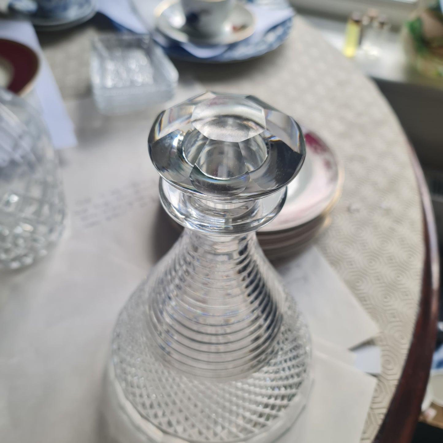 19th century ships decanters and stoppers
the ribbed necks above hobnail cut bands, 23cm high