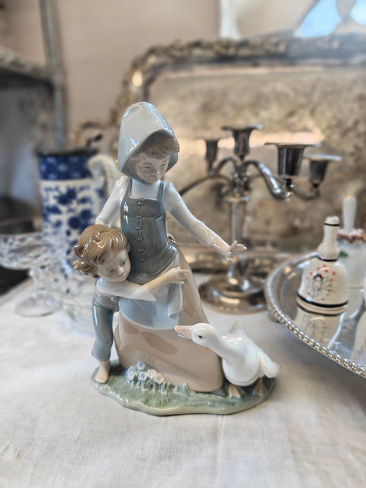 Lladro figures farm girl with goose