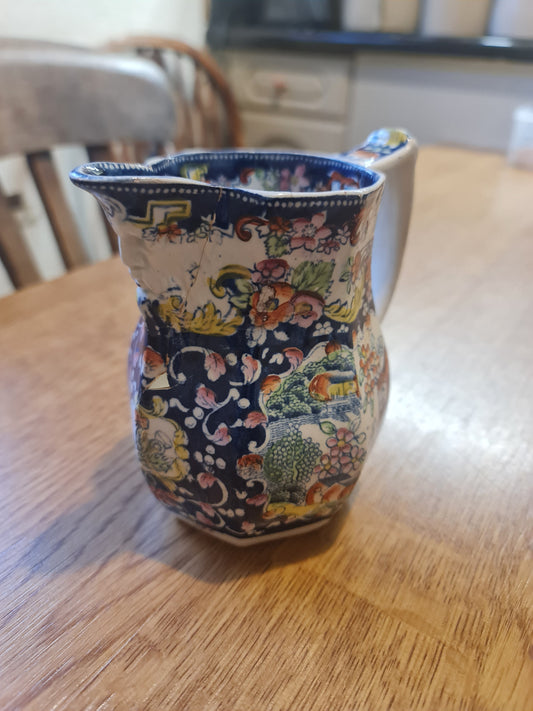 Antique opaque china handpainted jug-defect