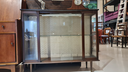 A Hubbinet 1960's glass display cabinet