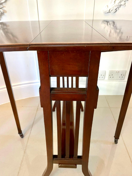 Edwardian High quality satinwood crossbanded Sutherland table