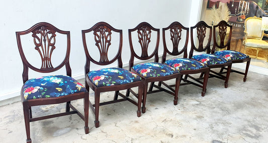 Chippendale style vintage dinning chairs  Newly upholstered velvet seat with gorgeous printed rose  Supported by scroll tapered feet. Imported from England Available in store now.