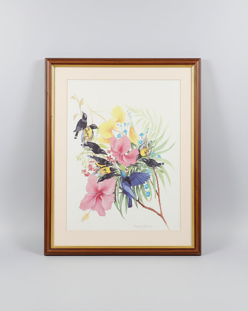 A vintage watercolor painting depicting birds and floral elements, nicely framed.