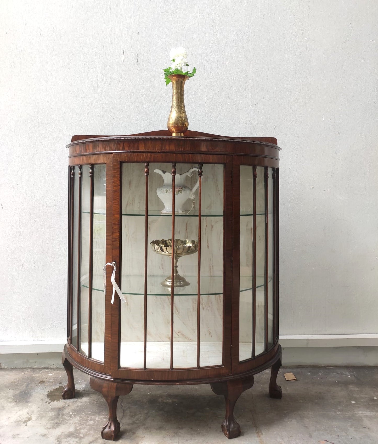 1900-1910 Bow front Mahogany Display cabinet with Ball Claw feet
